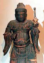 Wooden statue of Bhasamon