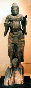 Wooden statue of Bhasamon