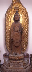 나무의 11면에 Guanyin 동상