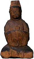 Wooden male god sitting statue