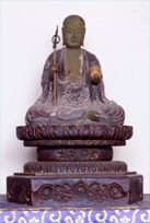 木Jizo禪宗坐的雕象